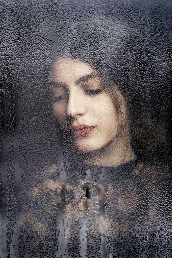 Pensive Woman Window by Saeed Zamani — canvas wall art