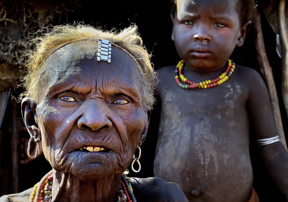 African Elder and Child by Giuseppe DAmico — canvas wall art