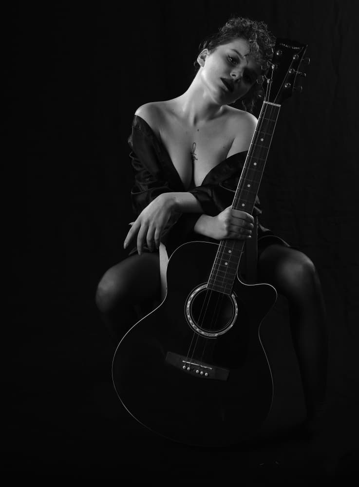 Sensual Guitarist Portrait by Enis Onur — canvas wall art