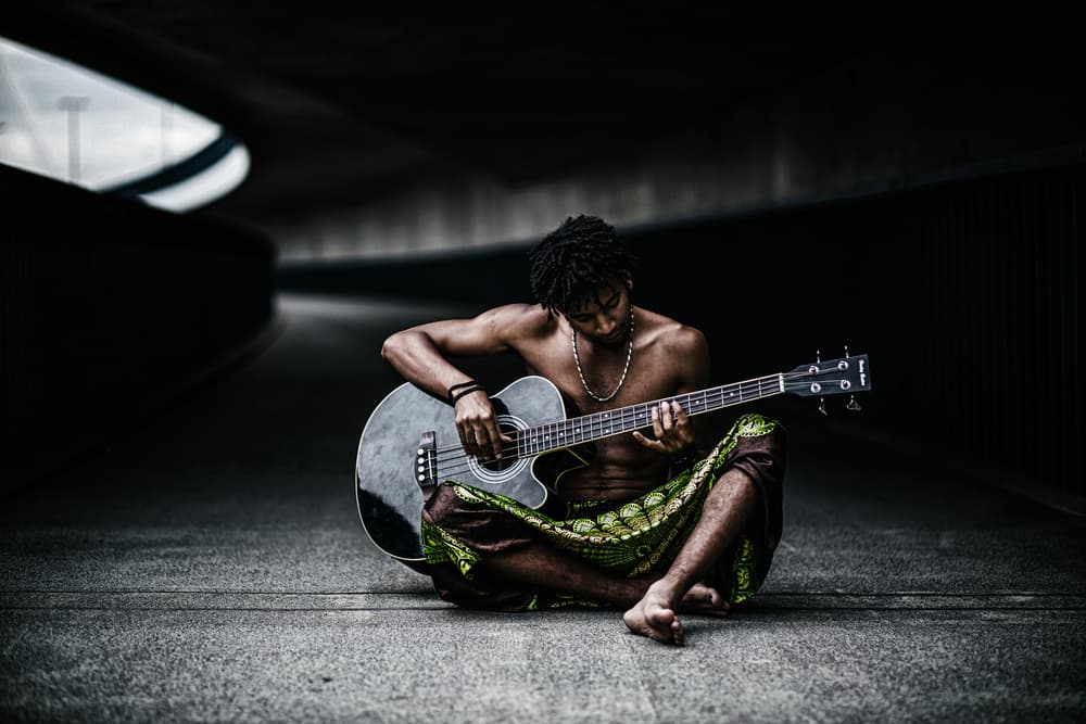 Soulful Street Guitarist by Erkan Camlilar — canvas wall art