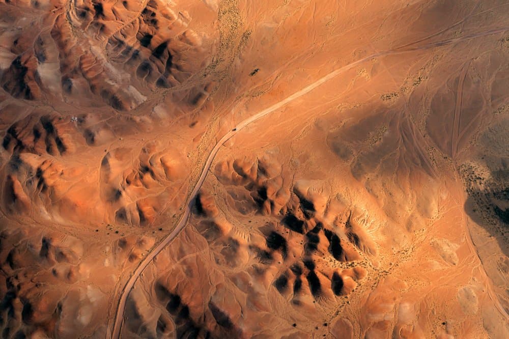 Golden Desert Road by Haitham AL Farsi — canvas wall art