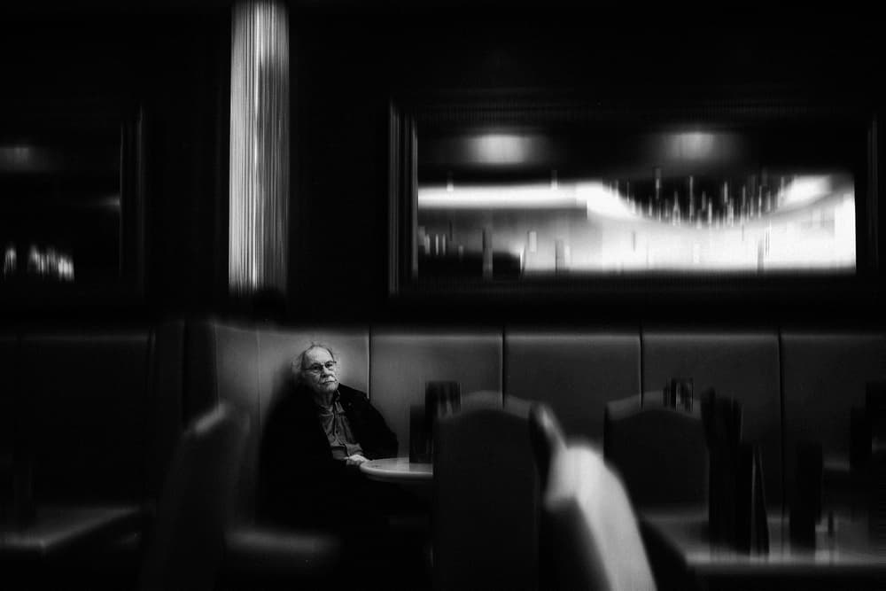 Solitary Man In Booth by Holger Droste — canvas wall art