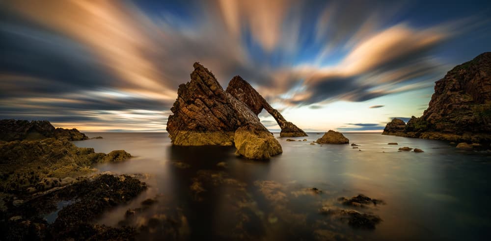 Dramatic Sea Arch Sunset by Wojciech Kruczynski — canvas wall art