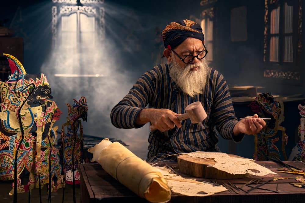 Master Craftsman Carving Puppets by Rahmad Adriansyah — canvas wall art