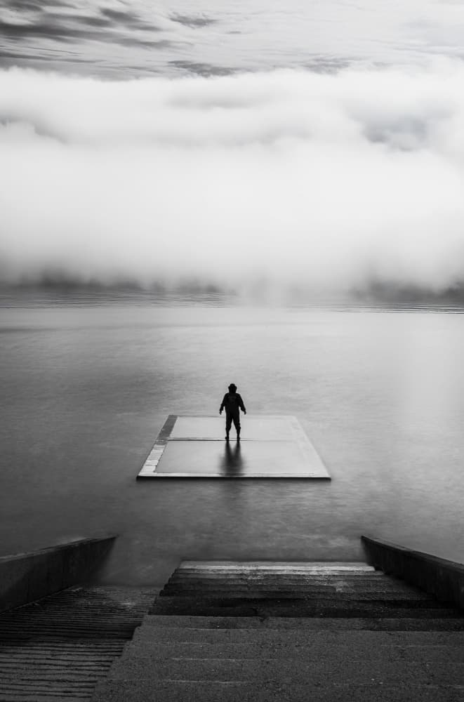 Lone Figure Misty Water by Bong Goo Kang — canvas wall art