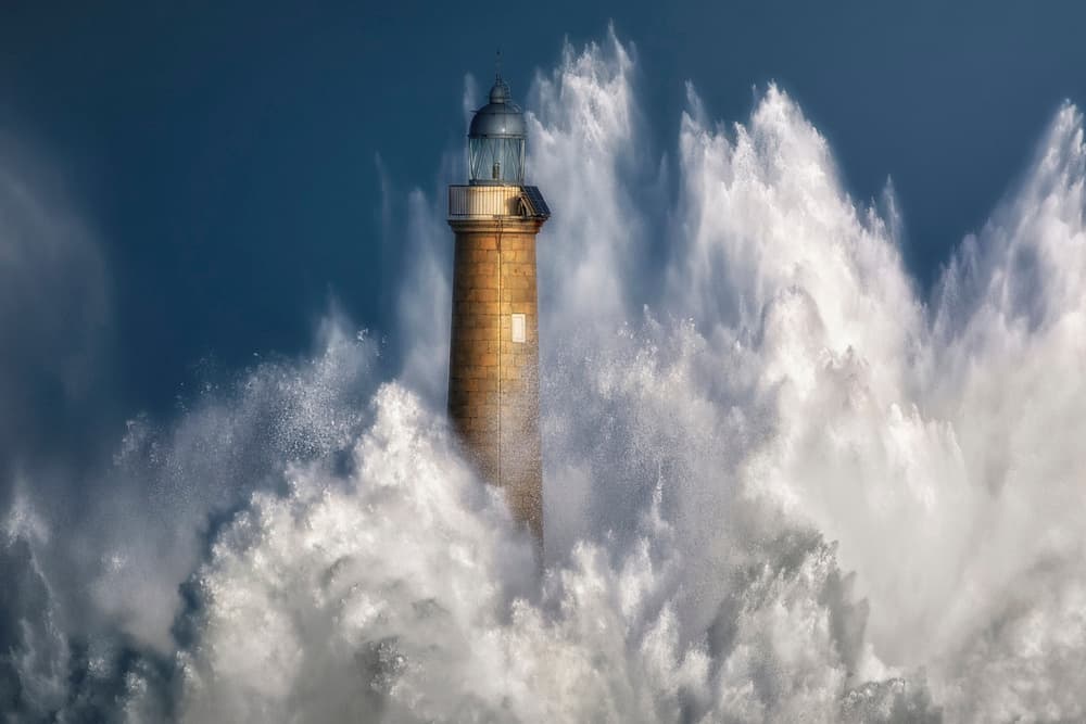 Lighthouse Crashing Waves by Sergio Saavedra Ruiz — canvas wall art