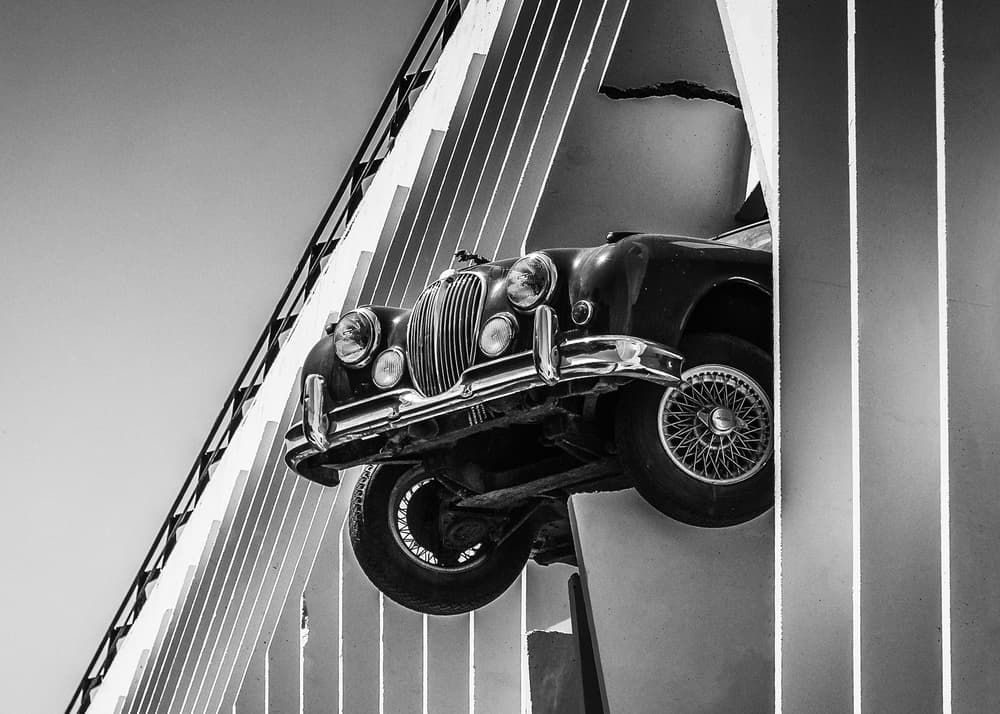 Classic Car Breaking Wall by Susan Moss — canvas wall art