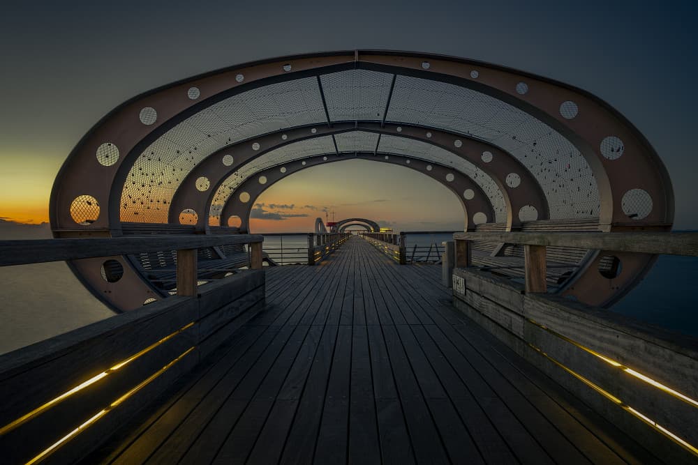 Twilight Arched Pier by Michael Eßig — canvas wall art