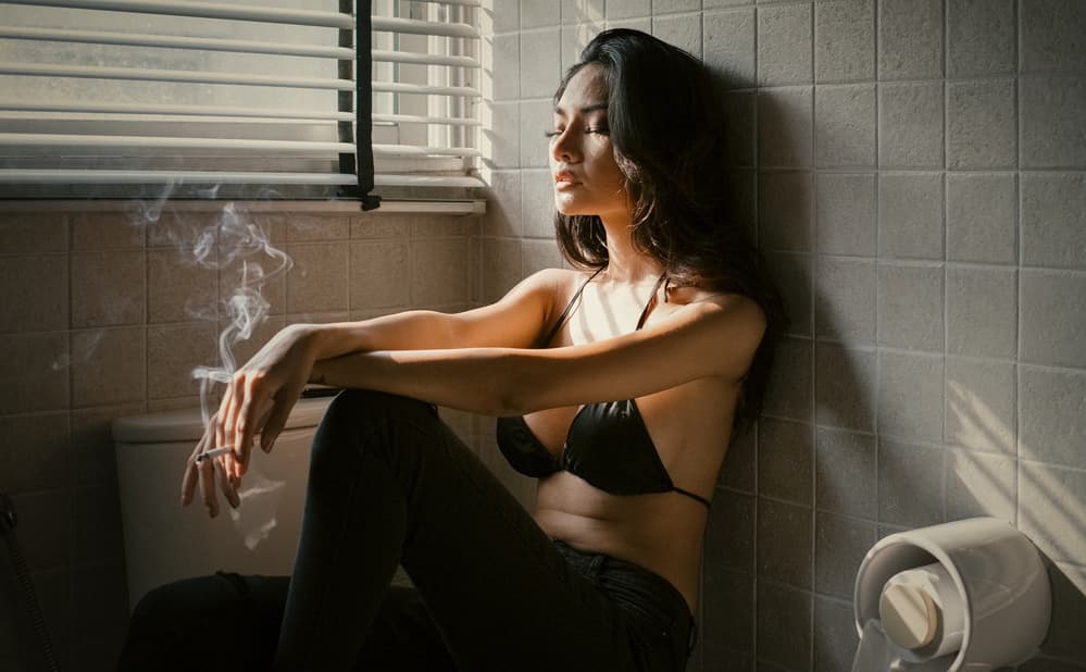 Woman's Pensive Smoke by ADIREK M — canvas wall art
