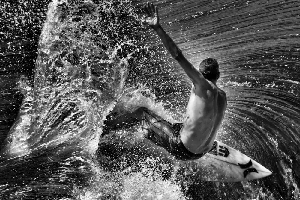 Surfer's Dynamic Splash by Donato Bellomo — canvas wall art