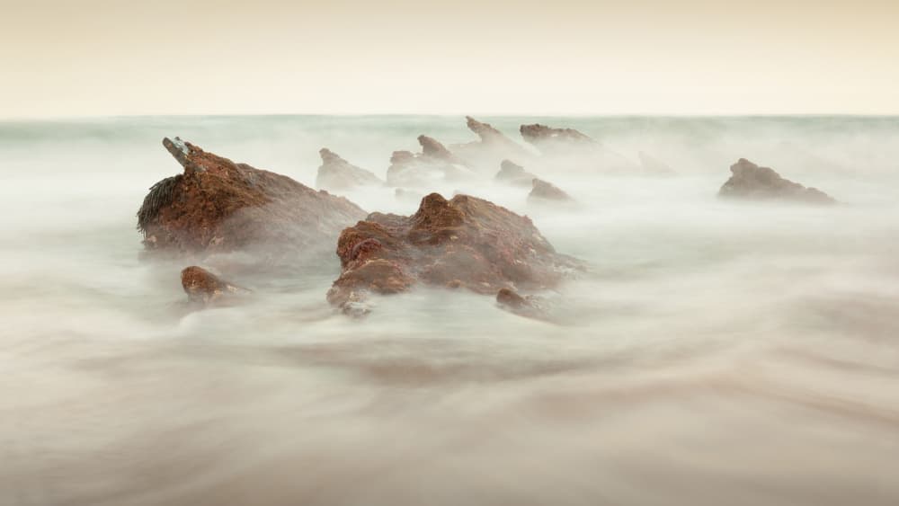Misty Ocean Rocks by Nuno Borges — canvas wall art