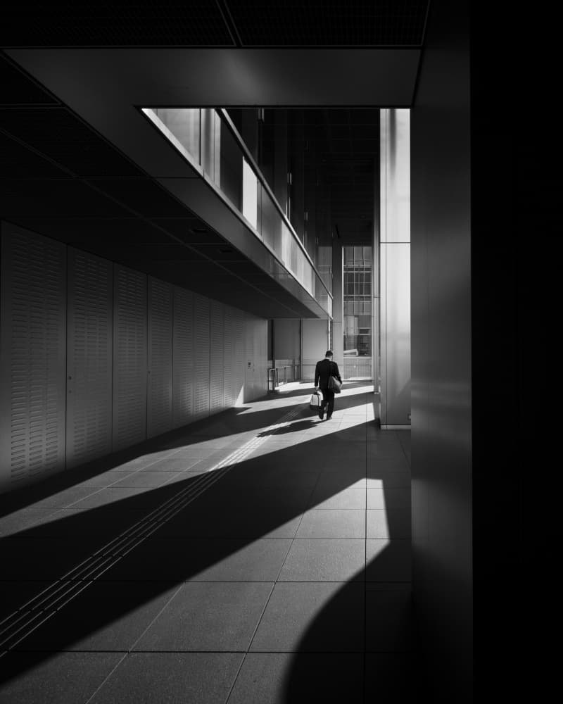 Man Walking Through Shadows by Yasuhiro Takachi — canvas wall art