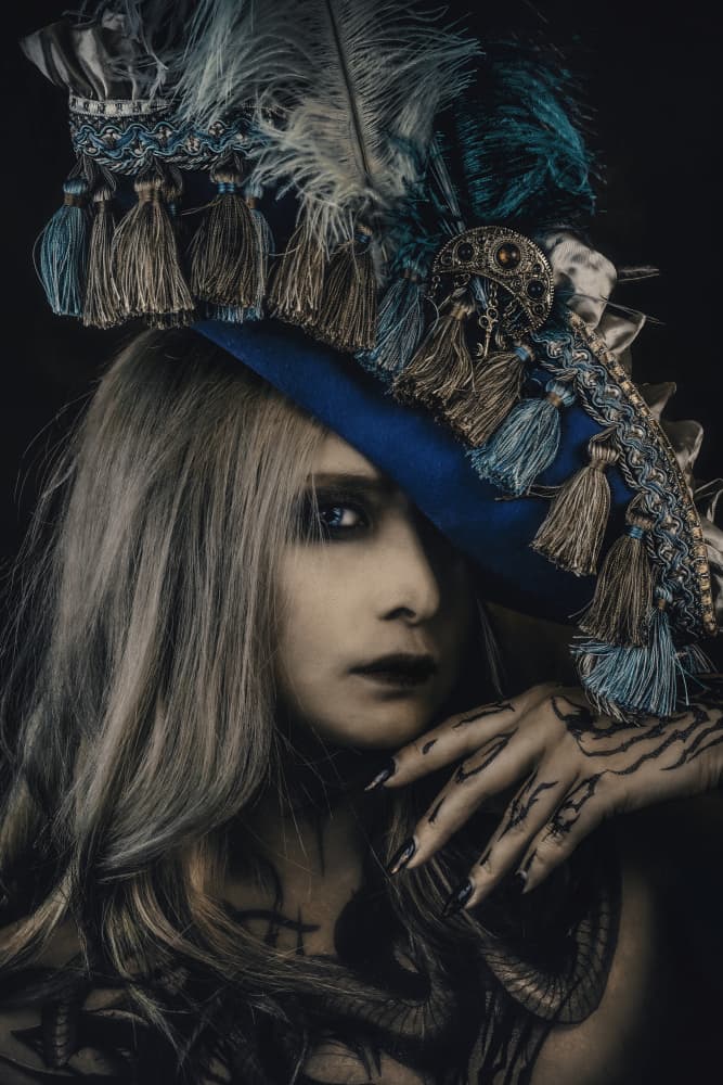 Ornate Blue Hat Portrait by KOIKI — canvas wall art