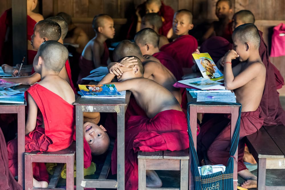 Young Monks Learning by Sunny Ding — canvas wall art