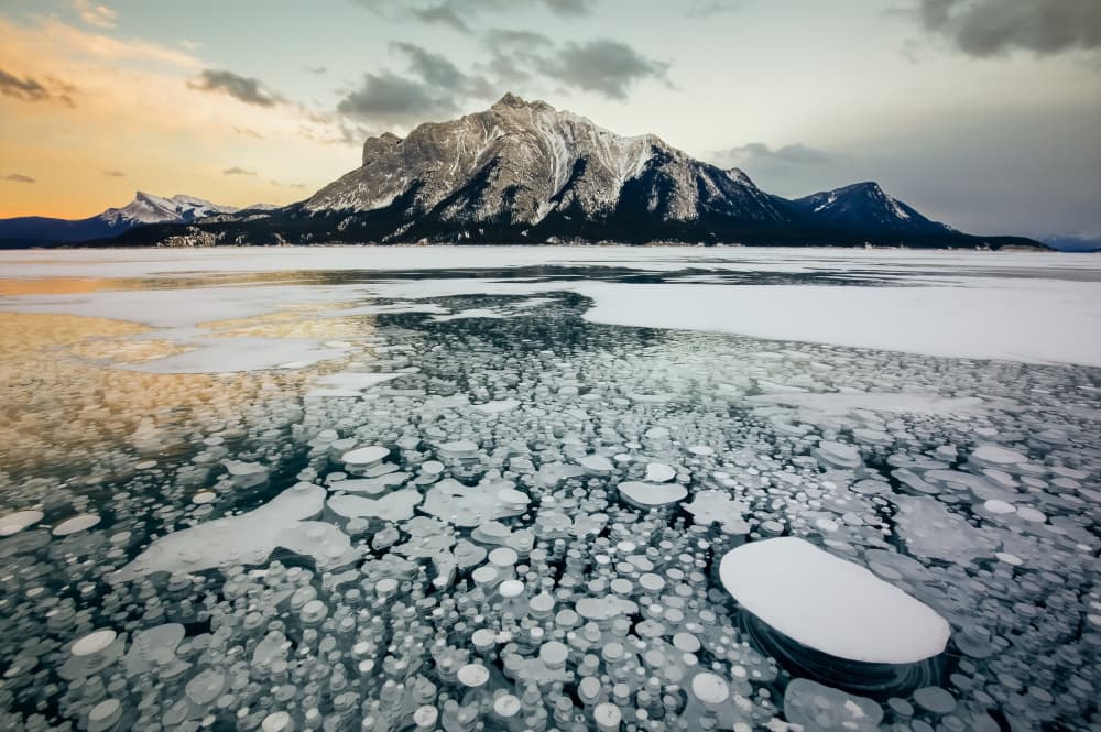 Mountain Lake Frozen Bubbles by Herbert Rong — canvas wall art