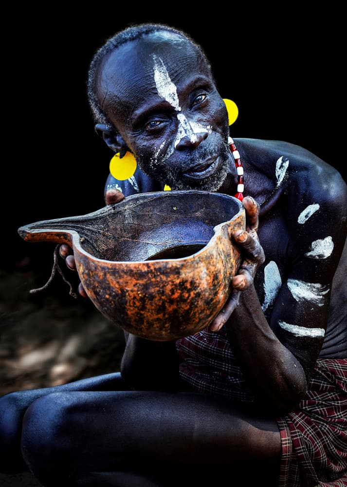 Tribal Elder with Gourd by Irene Perovich — canvas wall art
