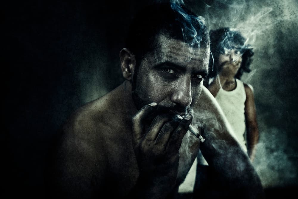 Intense Smoker And Child by FATHI ALDARWISH — canvas wall art