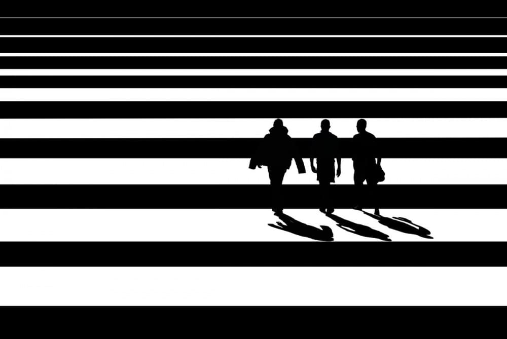 Three Silhouettes Crossing by Natalia — canvas wall art