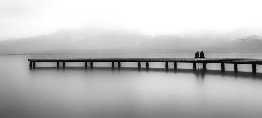 Serene Pier Reflection by Ummu Nisan Kandilcioglu — canvas wall art