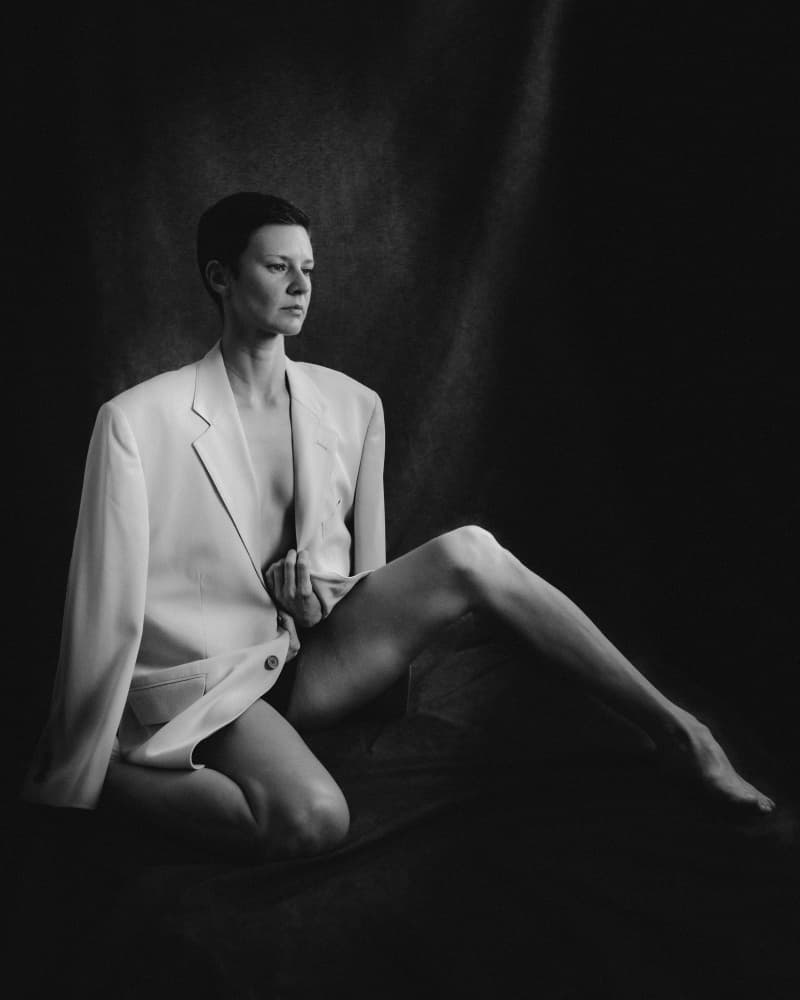 Pensive Woman in Blazer by Eiji Yamamoto — canvas wall art