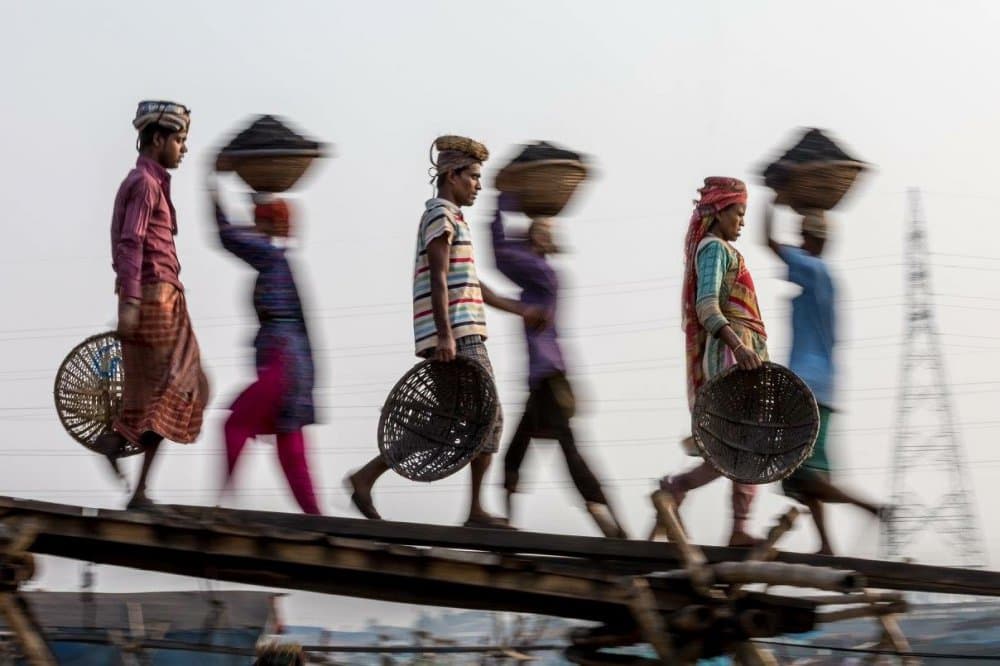 Daily Coal Carriers by Patrik Minar — canvas wall art