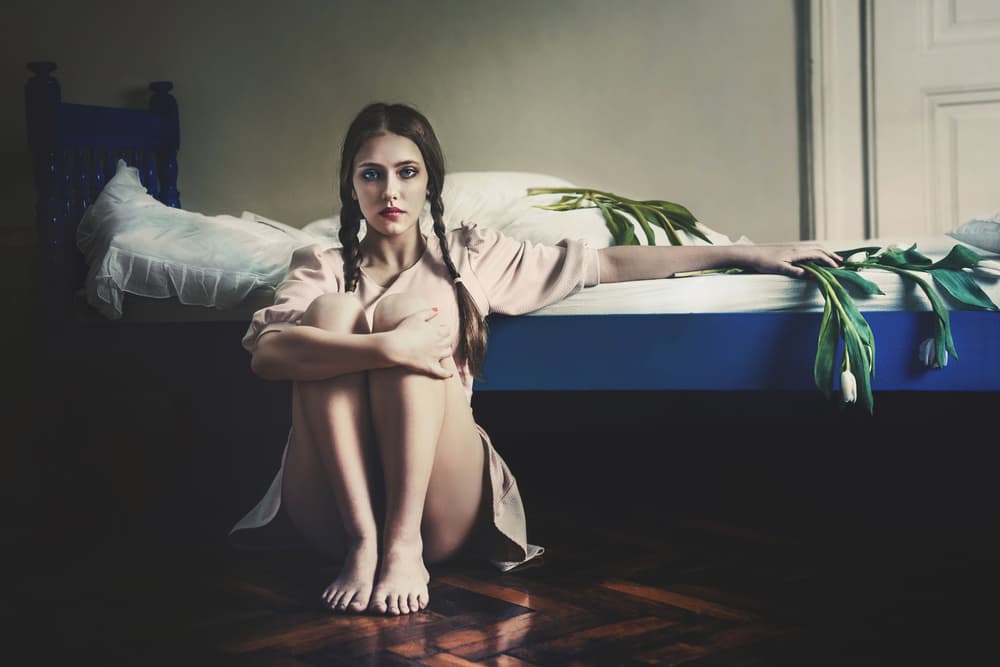 Pensive Girl By Bed by Bettina Tautzenberger — canvas wall art