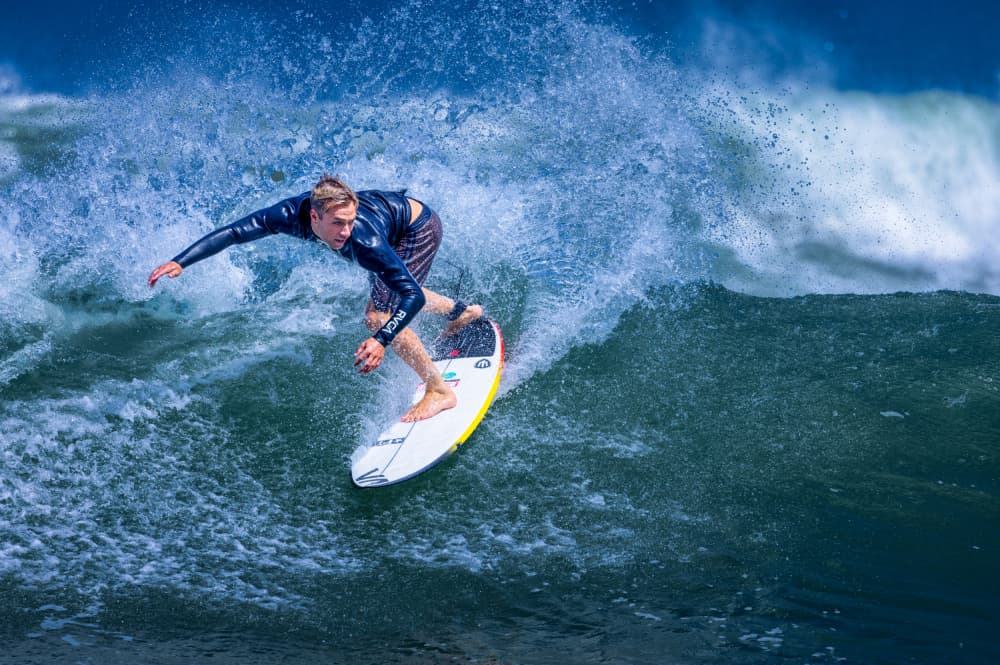 Surfer Carving Wave by Dennis Zhang — canvas wall art