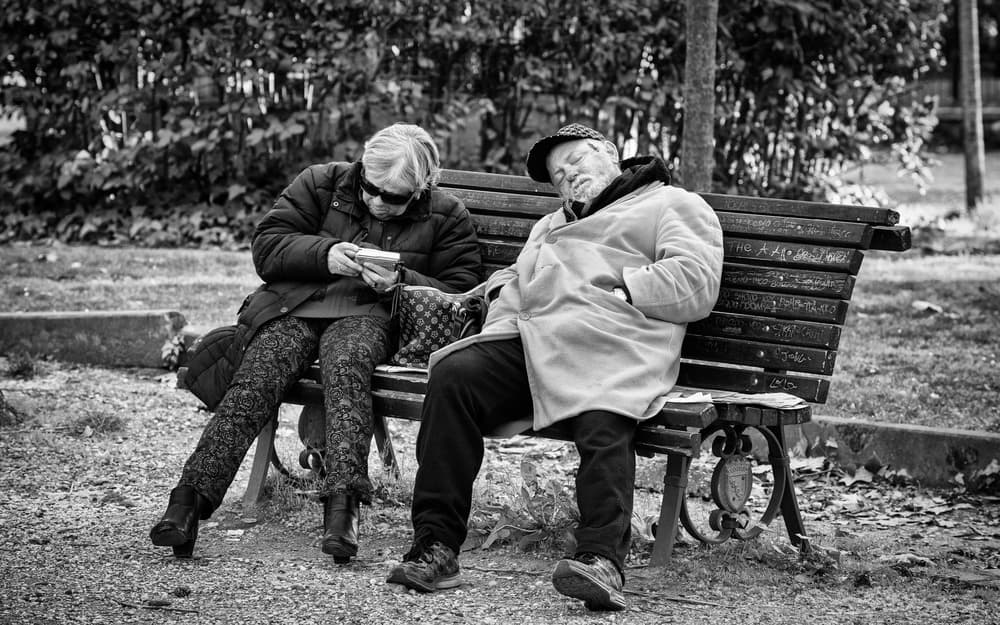 Elderly Couple Park Bench by Riccardo Lucidi — canvas wall art