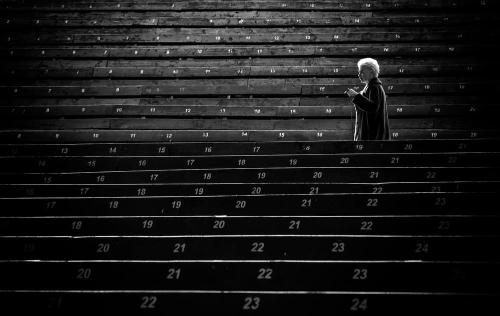 Solitary Figure Stadium Steps by Anna Niemiec — canvas wall art