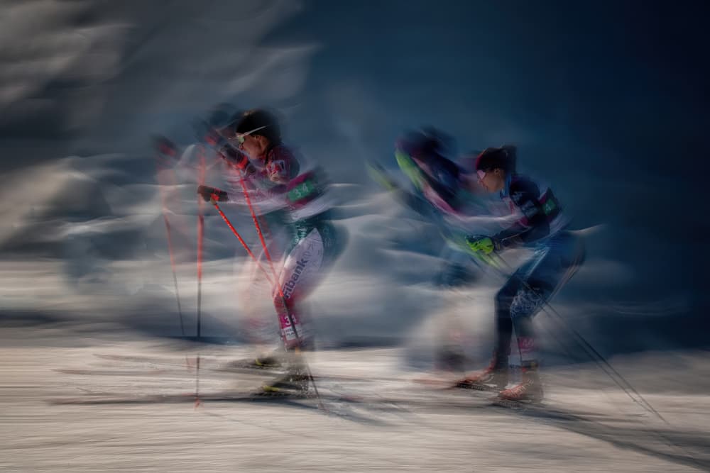 Dynamic Skiers on Snow by Milan Malovrh — canvas wall art