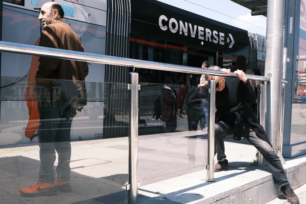Candid Urban Reflection by Ali Ayer — canvas wall art