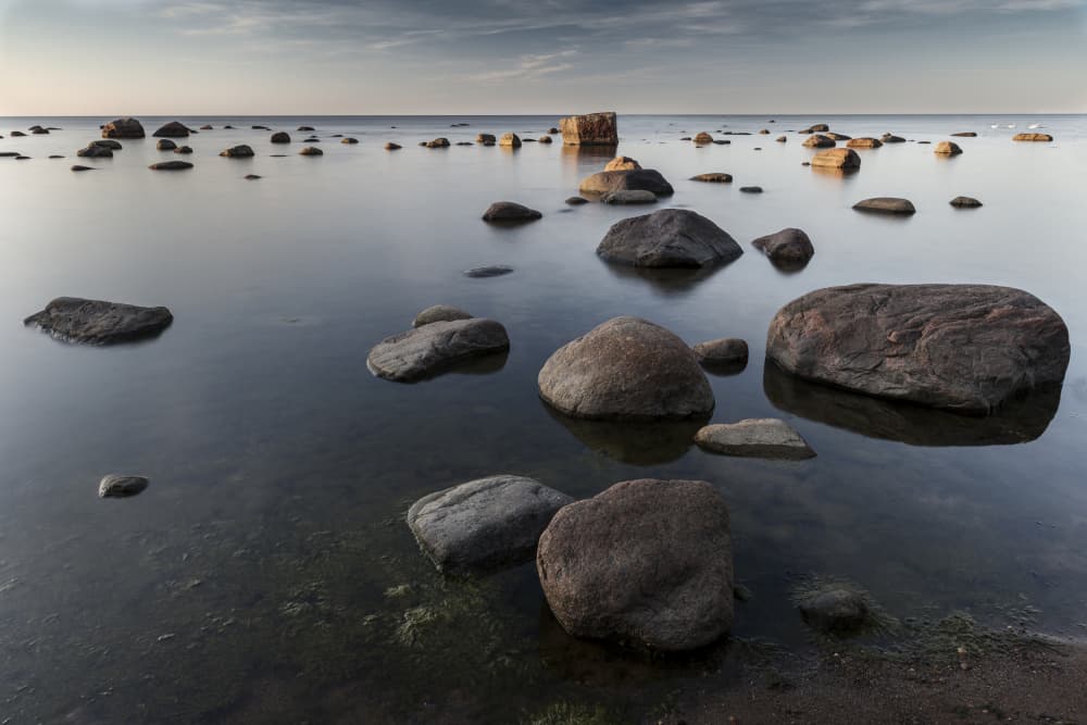 Peaceful Coastal Rocks by Hans Repelnig — canvas wall art