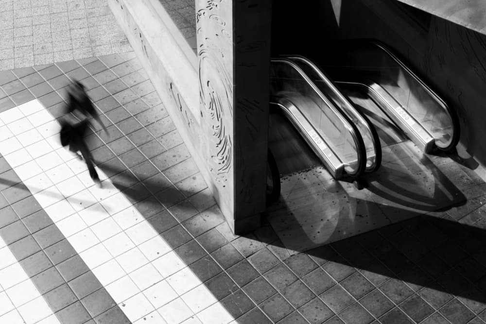 Urban Motion Escalator Shadows by Olga Varlakova — canvas wall art