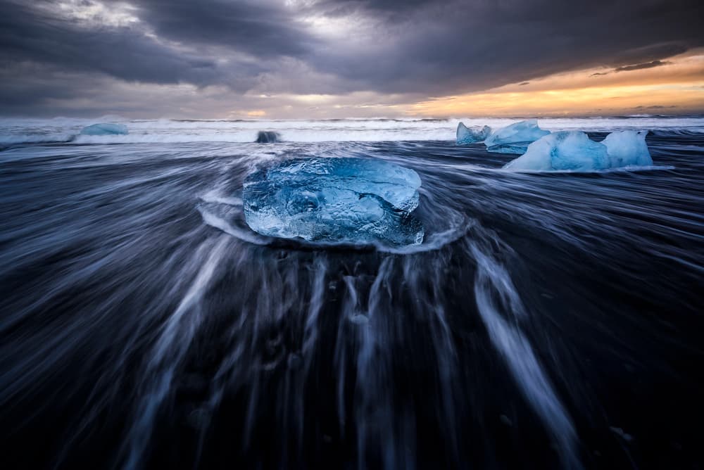 Blue Ice Black Sands by Jorge Ruiz Dueso — canvas wall art