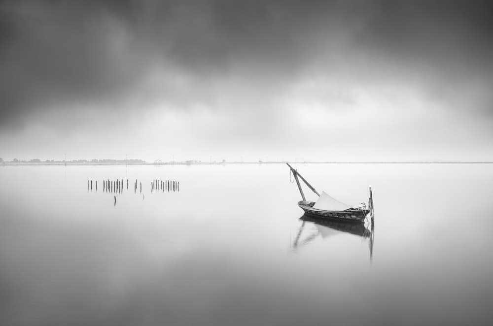 Lonely Boat Reflection by George Digalakis — canvas wall art