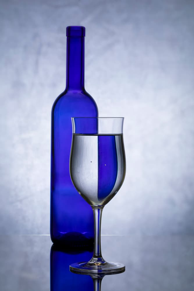 Blue Bottle Reflection by Azriel Yakubovitch — canvas wall art