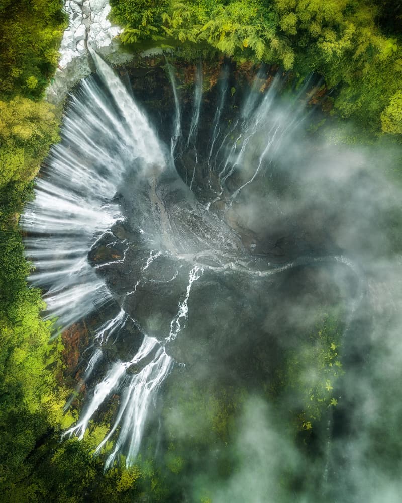 Misty Jungle Waterfall by Mainak Dan — canvas wall art