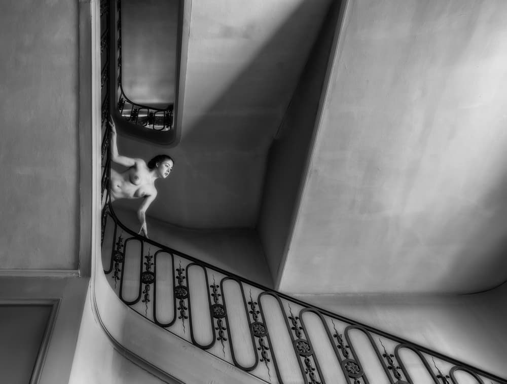 Elegant Nude Grand Staircase by Luc Stalmans — canvas wall art