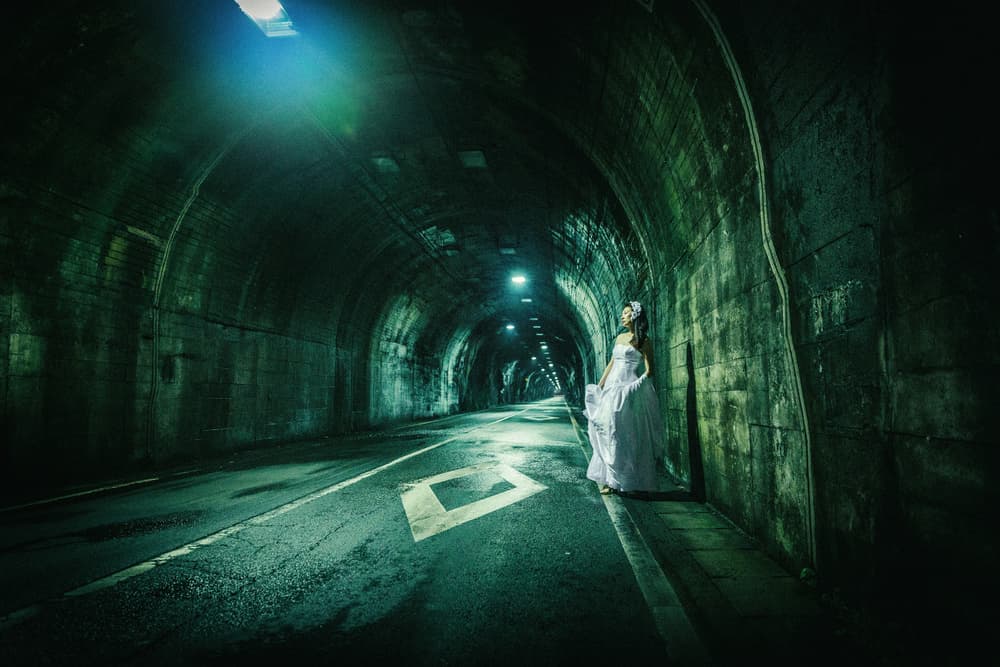 Woman In Dark Tunnel by Daisuke Kiyota — canvas wall art