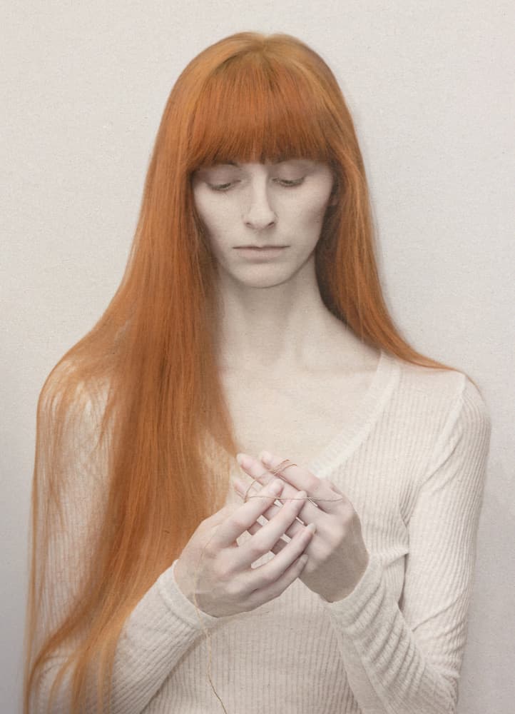 Redhead Holding Thread by Joanna Ras — canvas wall art