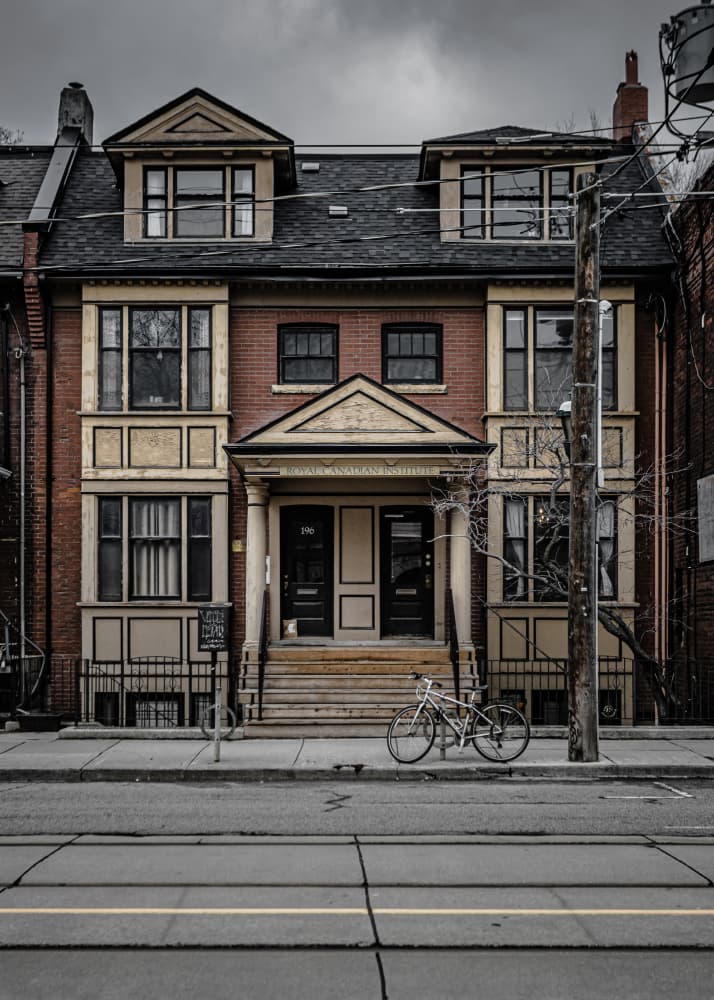 Urban Building with Bicycle by The Learning Curve Photography — canvas wall art