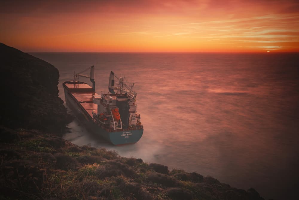 Stranded Ship Sunset by Daniele Atzori — canvas wall art
