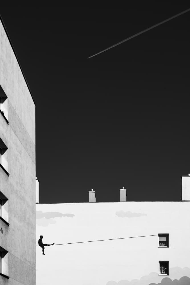 Urban Tightrope Walker by Anna Niemiec — canvas wall art