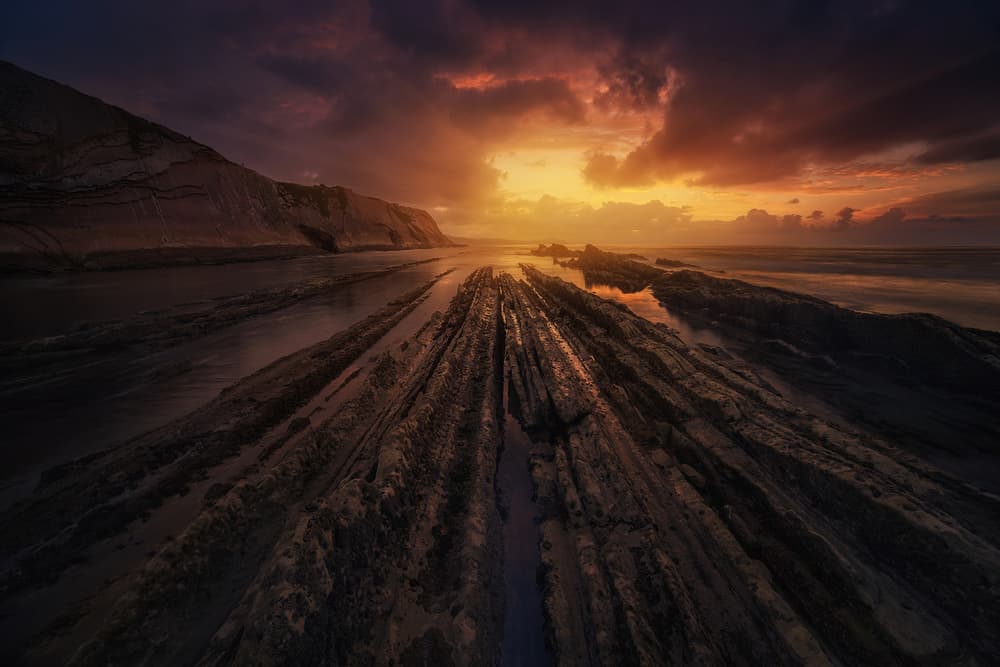 Fiery Coastal Formation by Miguel Angel Martin Campos — canvas wall art