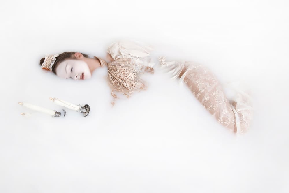 Serene Milk Bath Portrait by Carola Kayen-Mouthaan — canvas wall art