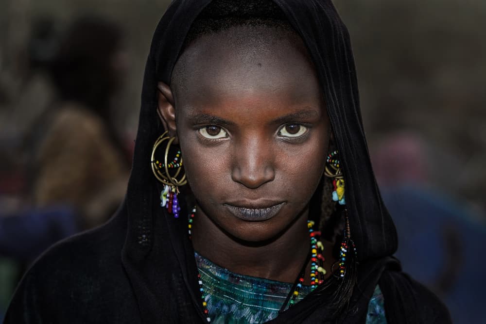African Girl's Gaze by Joxe Inazio Kuesta Garmendia — canvas wall art