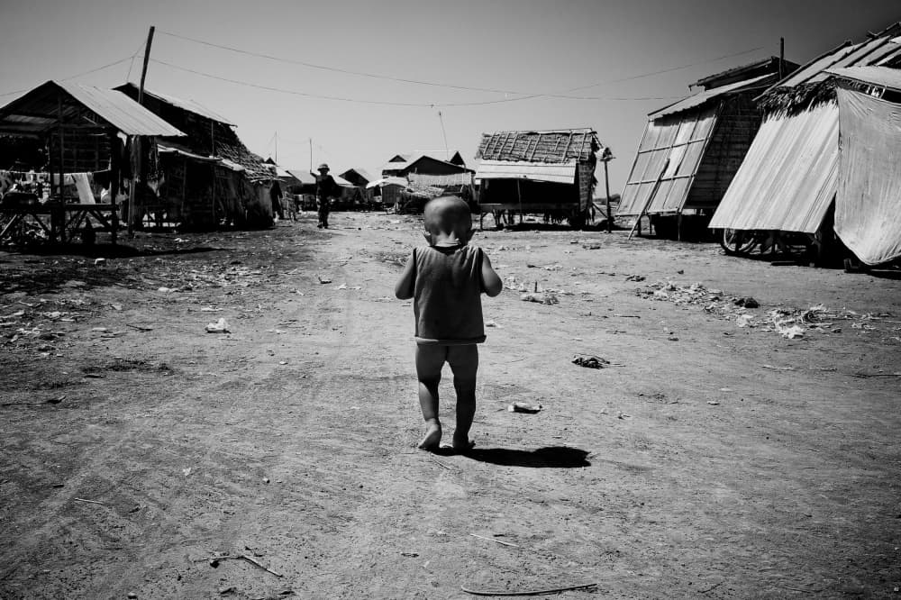 Child Walking Village Road by Shinji Isobe — canvas wall art