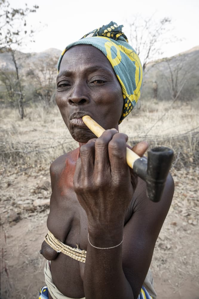 African Elder Smoking Pipe by Elena Molina — canvas wall art