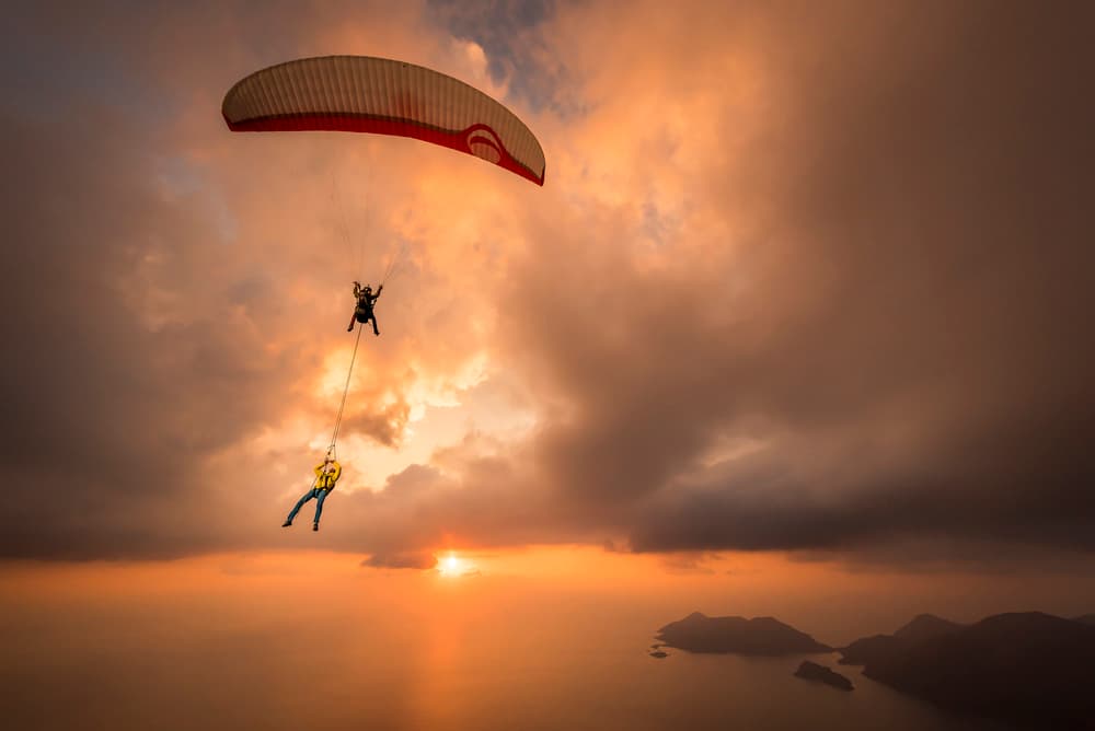 Sunset Paragliding Adventure by Tristan Shu — canvas wall art