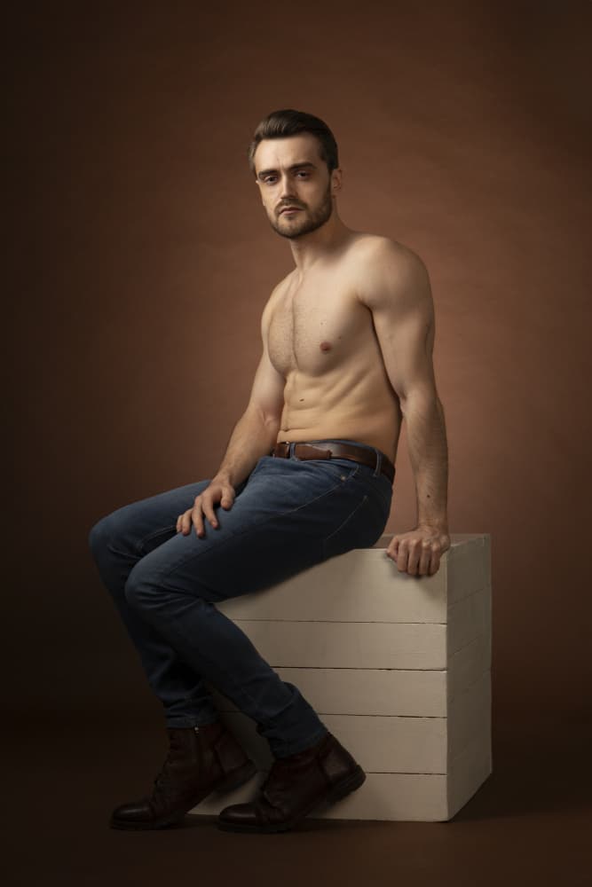 Confident Man Studio Portrait by Carmen Watkins — canvas wall art